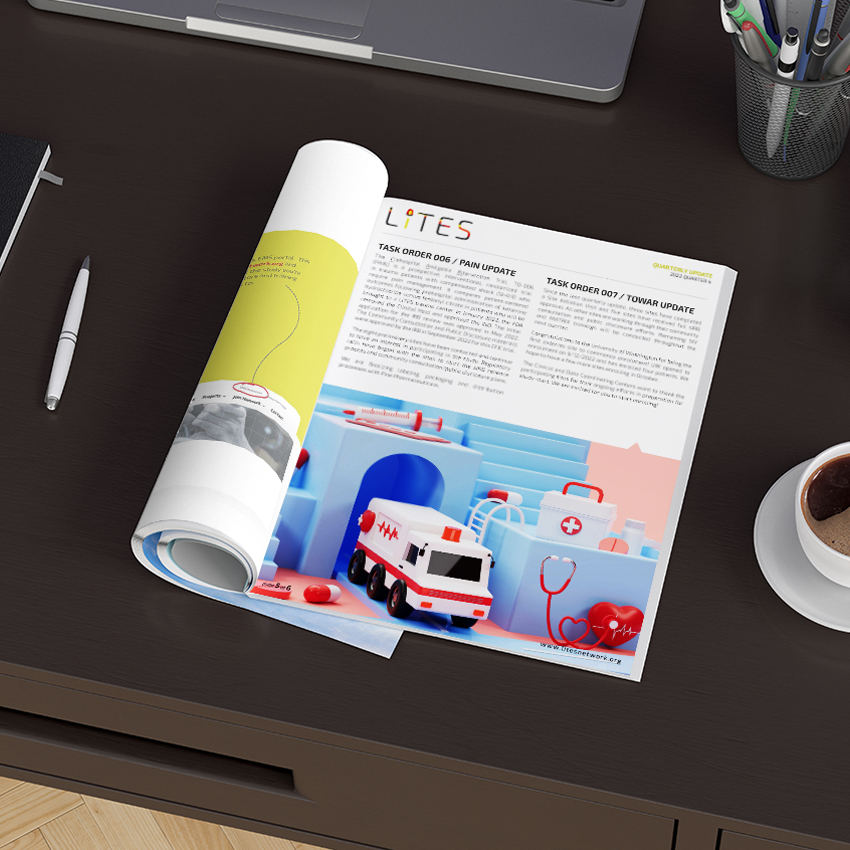 Newsletter laying on desk showing print design example